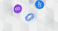 a group of different colored buttons sitting on top of a white surface